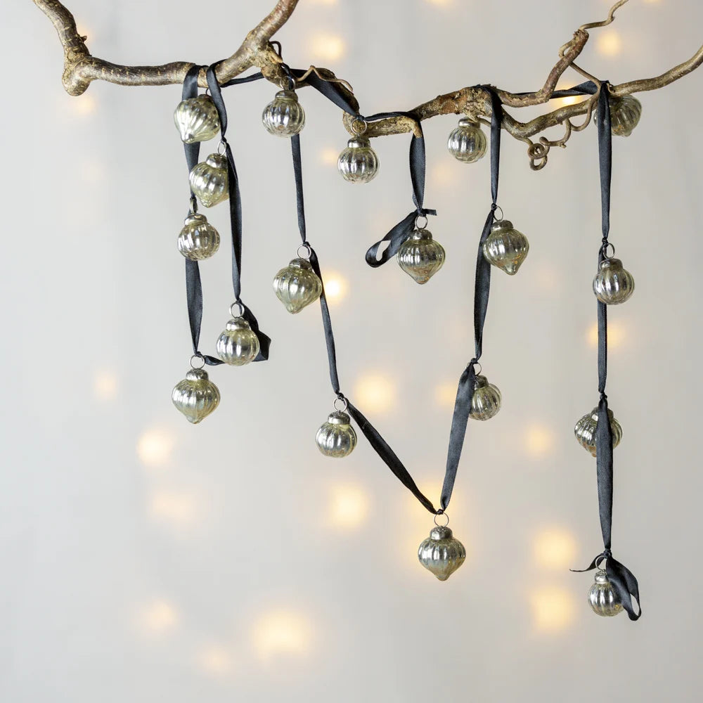 Small silver bauble garland on black ribbon