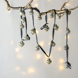 Small silver bauble garland on black ribbon