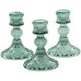 Harlequin green glass candlestick