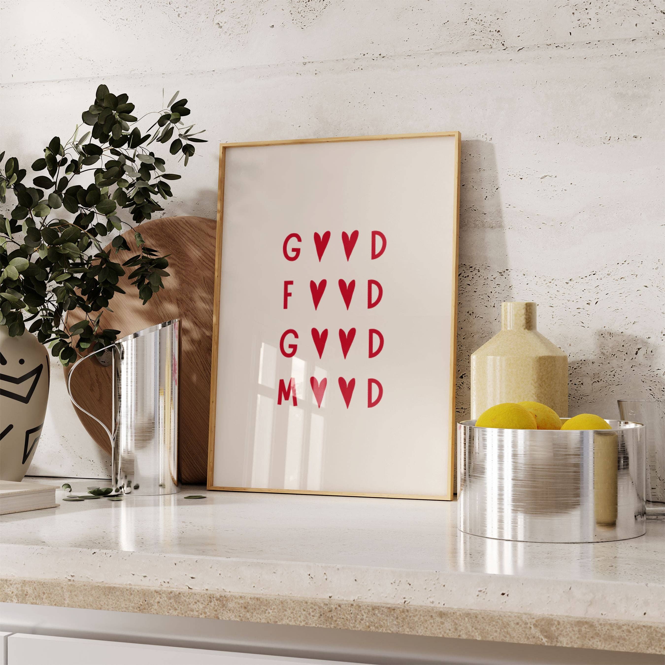 Oak frame with red typography print styled in modern kitchen setting