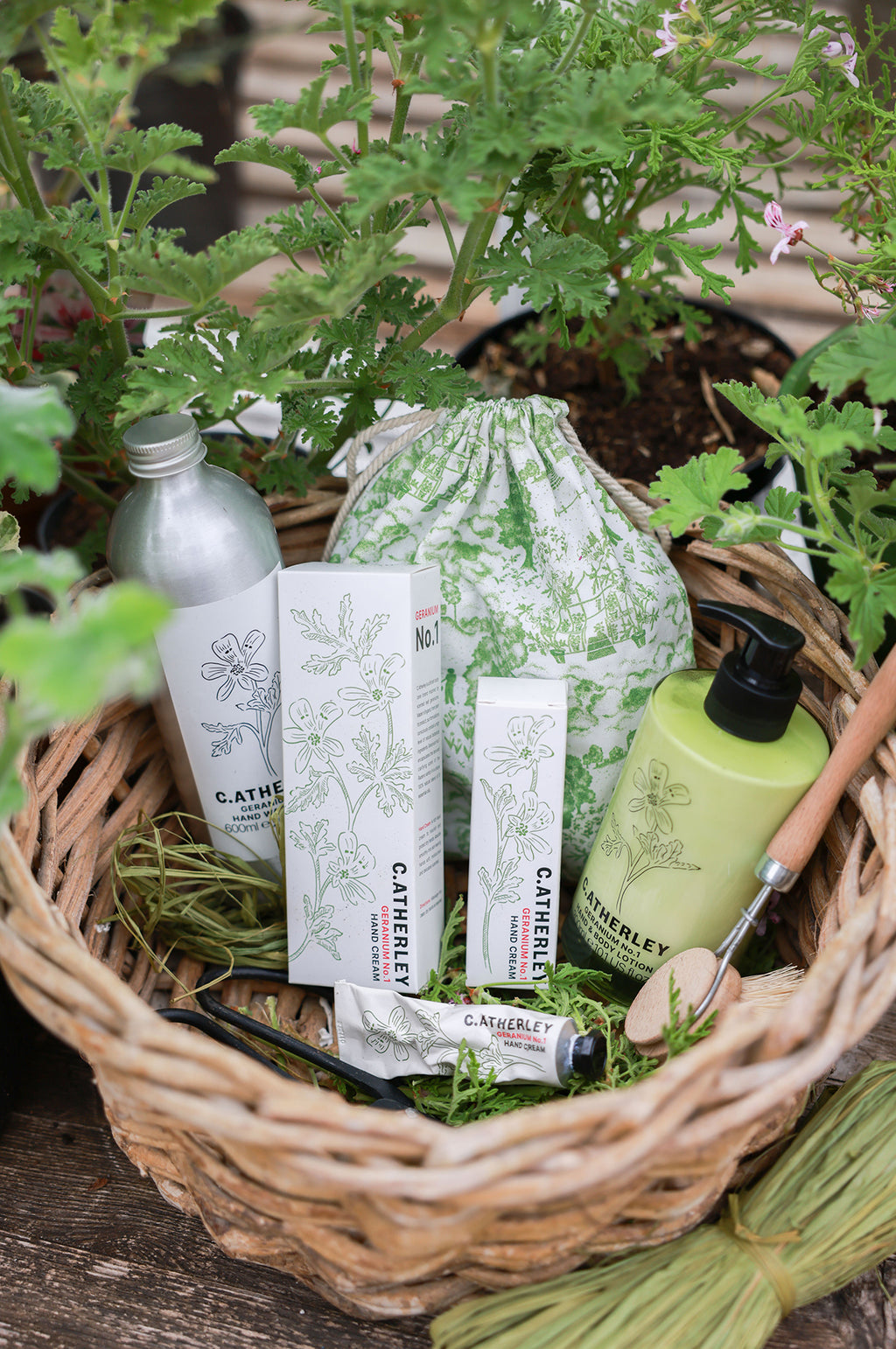 Luxury Catherine Geranium hand and body lotions styled in a basket