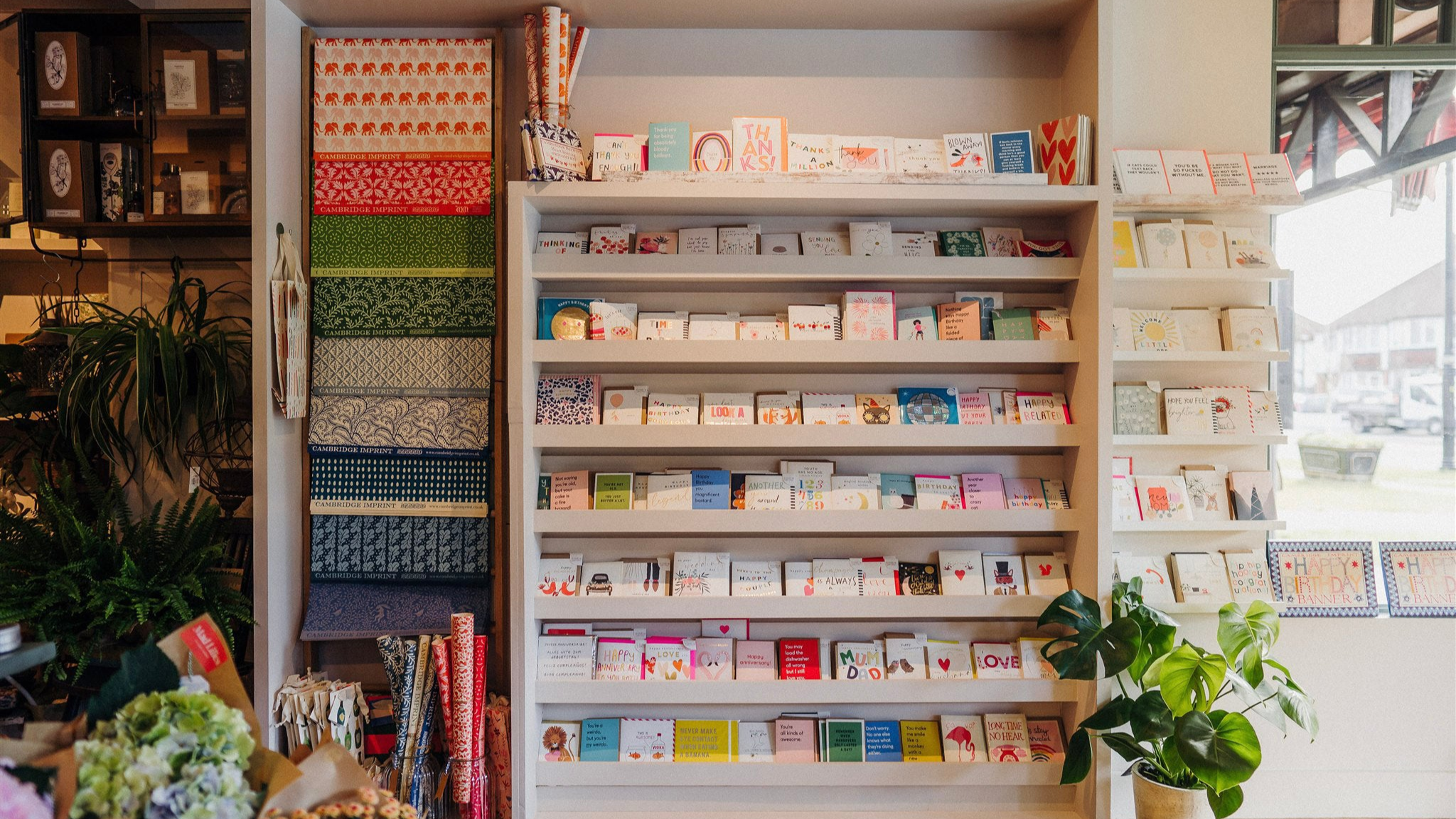 Card wall showcasing greetings cards for birthdays, anniversaries and thank you messages at Mad Lilies Banstead