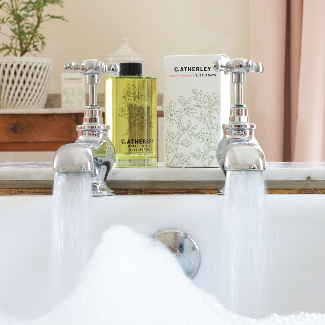 Relaxing bath scene with a bathtub and wooden bath stand holding a lit candle, surrounded by soft, ambient lighting for a calm, spa-like atmosphere.
