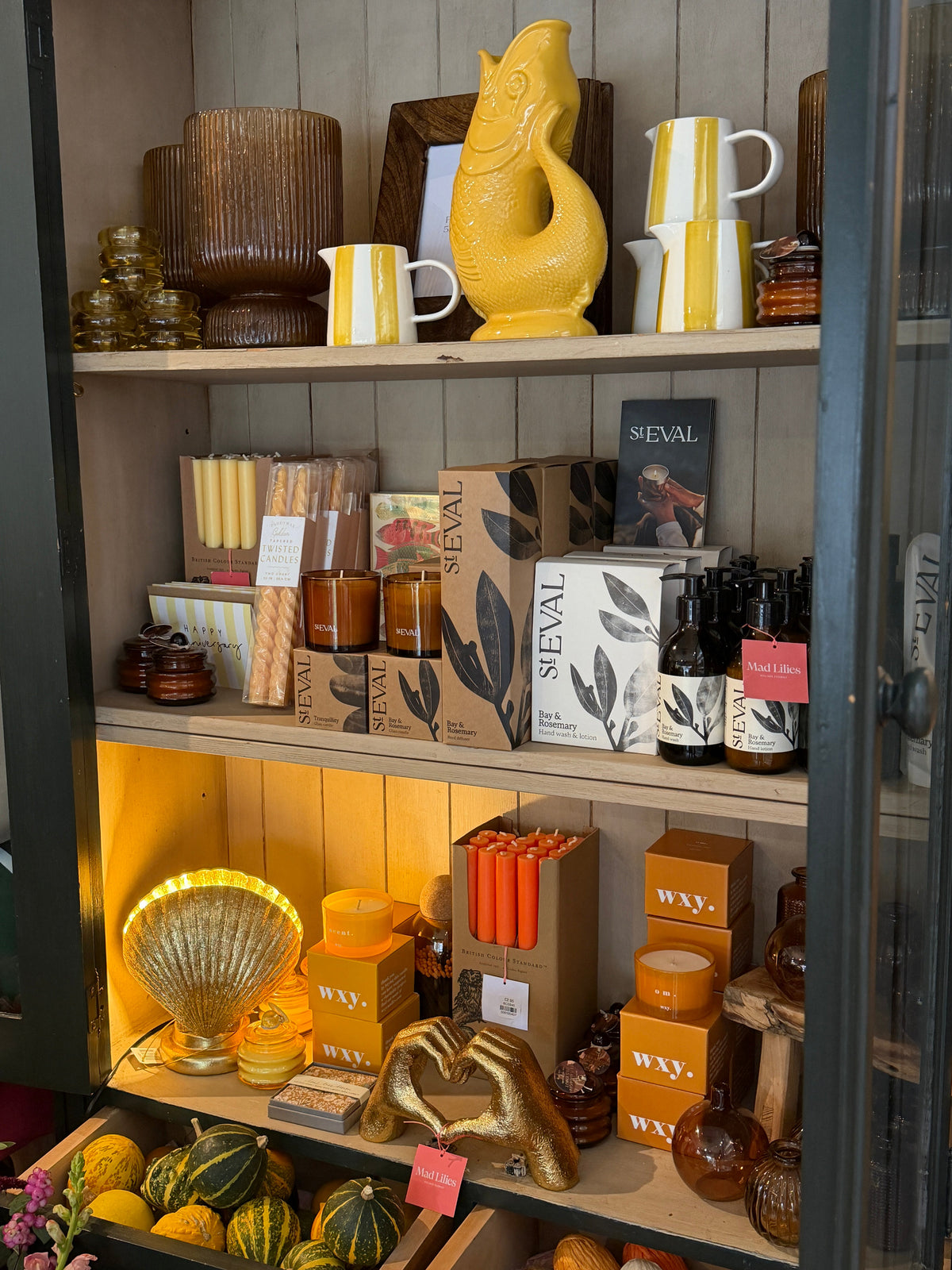 Discover The Autumn Living Edit: woven baskets, candles, earthy ceramics, rich greens, warm amber tones, pumpkins and gourds for cosy seasonal living.