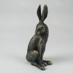 Antique bronze sitting hare ornament with detailed fur texture, decorative resin woodland sculpture for country and contemporary interiors.