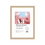 Oak A3 picture frame with A4 mount displaying artwork