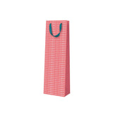 Let's Celebrate bottle gift bag featuring colourful repeat typography design by Ashkahn
