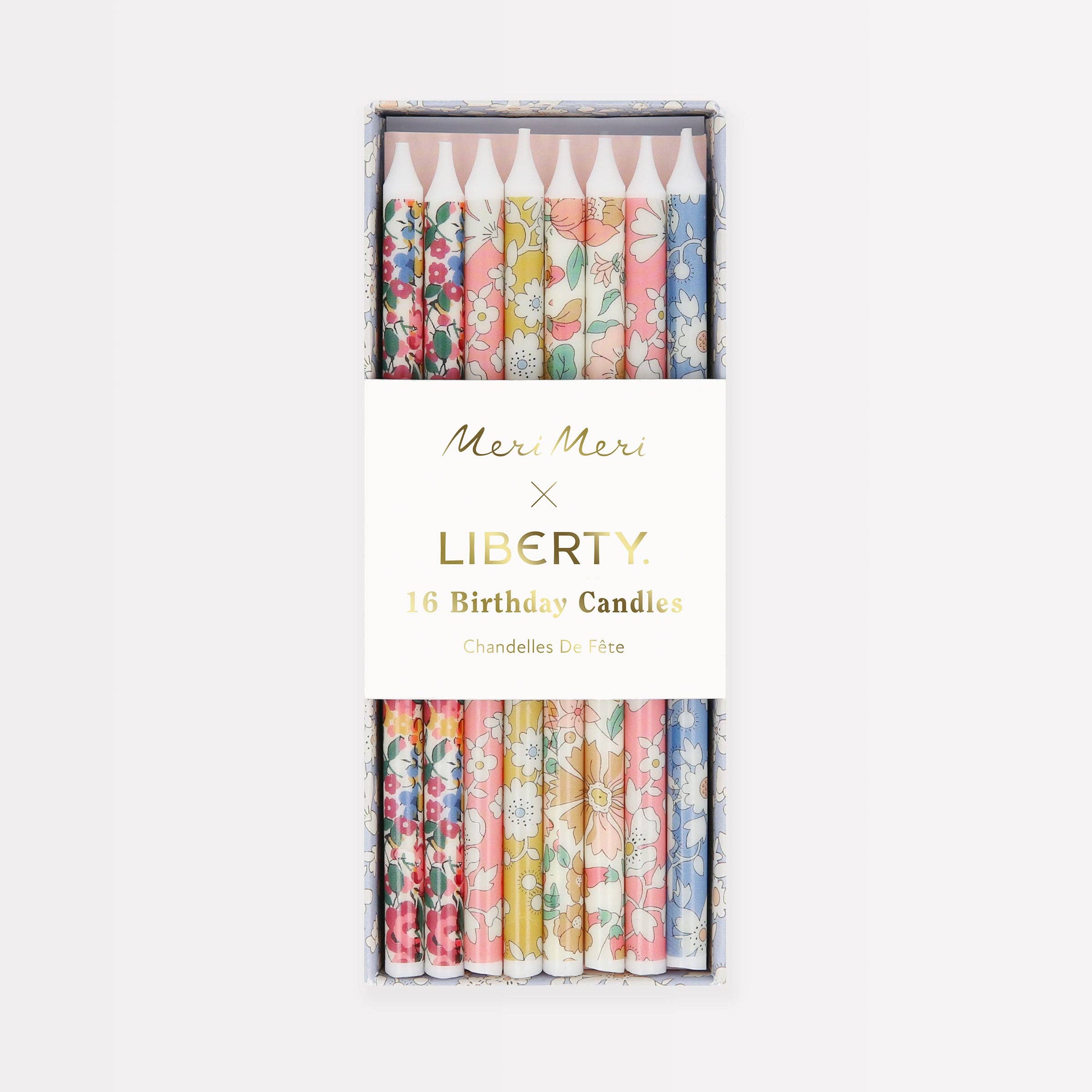 Set of Liberty floral print birthday candles from the Meri Meri x Liberty collaboration presented in a Liberty print gift box.