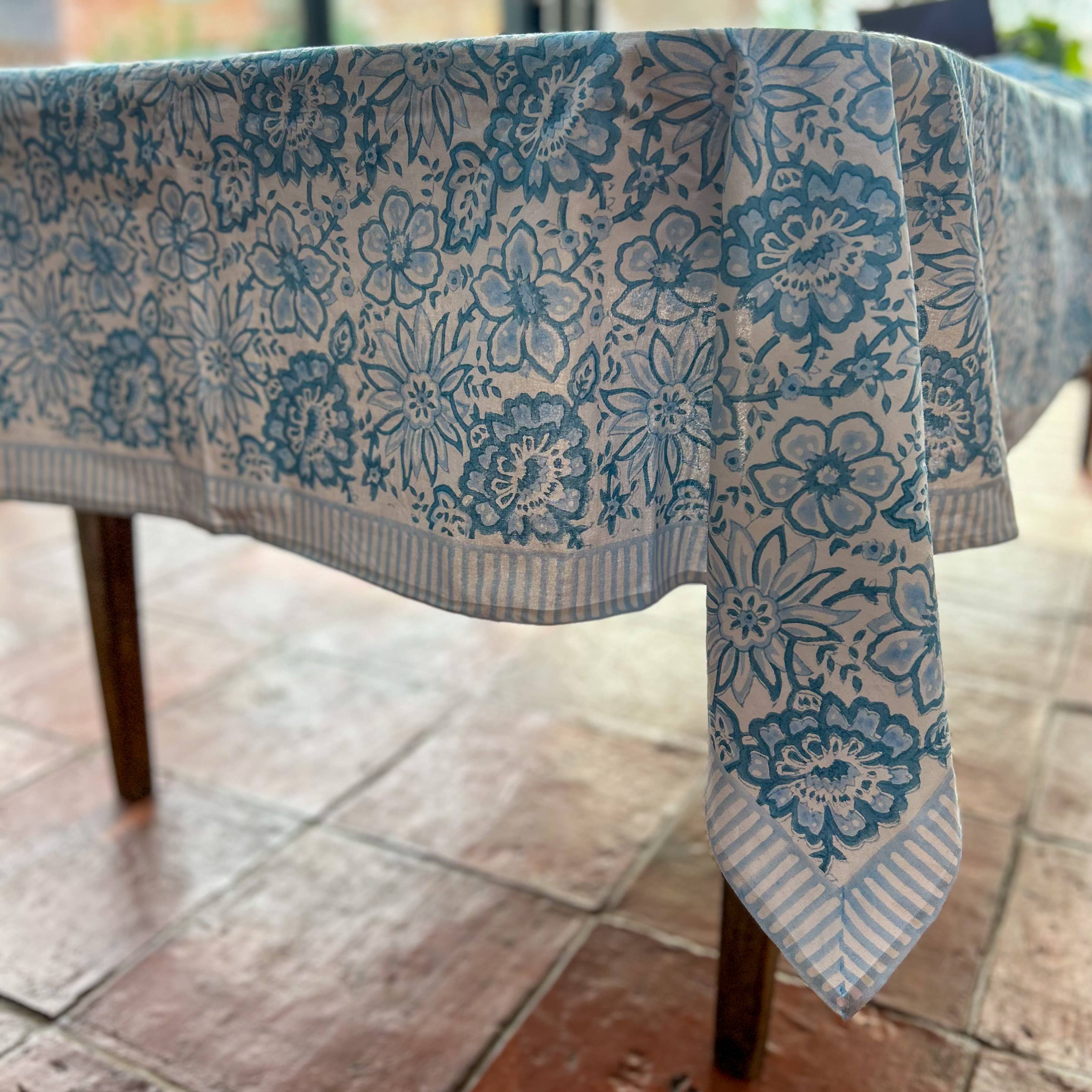 Baby blue block printed tablecloth styled on dining table