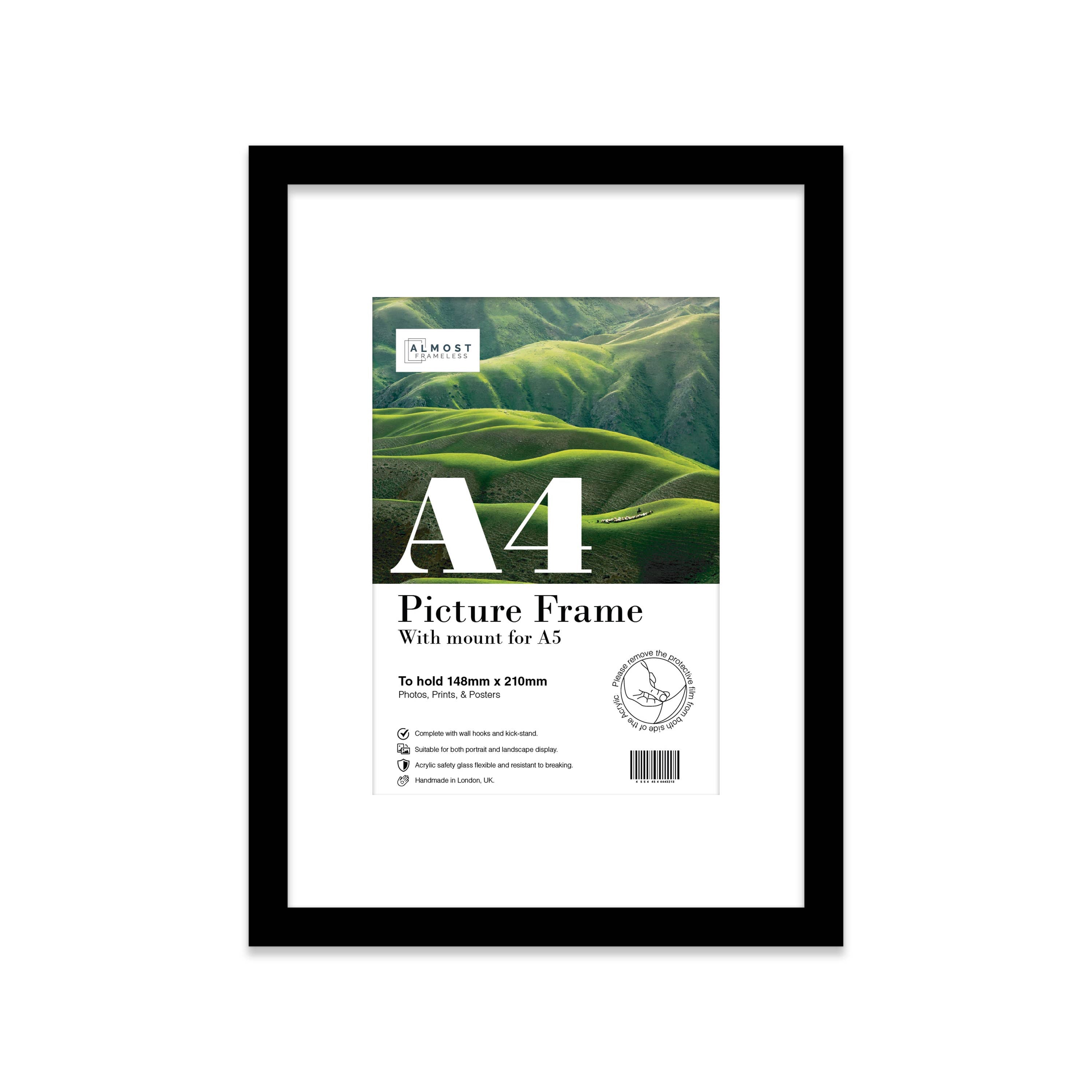 Modern black frame with mount styled on shelf