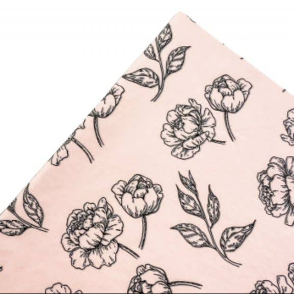 Floral patterned tissue paper with black peonies on a pink background