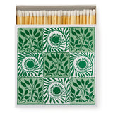 Green and white arts and crafts box of matches