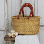 Shopping basket with leather handles