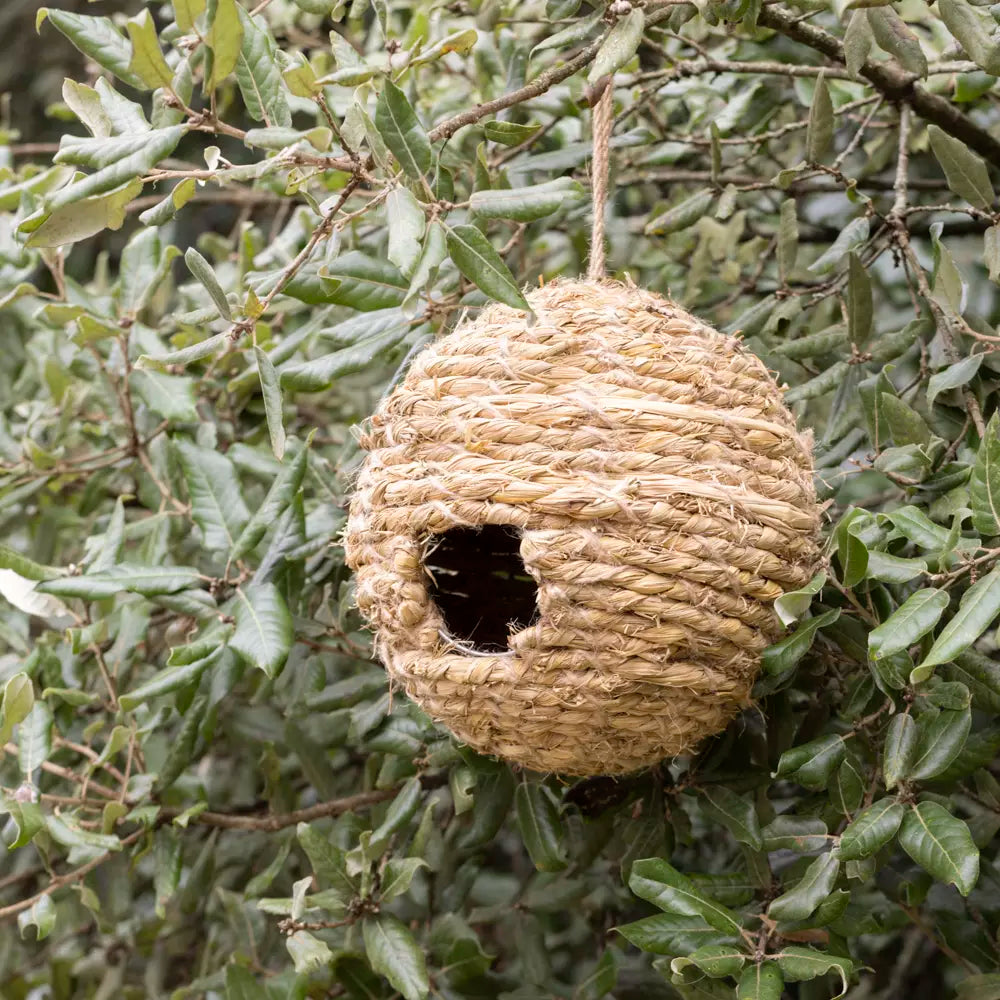 Natural material woven bird house