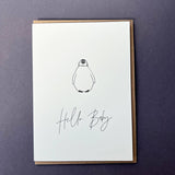 Welcome a new arrival with the Hello Baby Penguin Letterpress Card by Penguin Ink. Printed on 100% recycled board with a tactile embossed finish and blank inside.