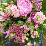 Pink peony bouquet with complementary seasonal pink flowers