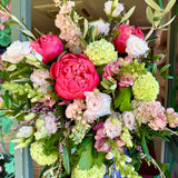 Watermelon & Mint bouquet featuring Coral Charm peonies, blush pink lisianthus, snapdragons and fresh green viburnum.