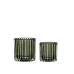 green ribbed candle holders with a clear ribbed design allowing light to pass through