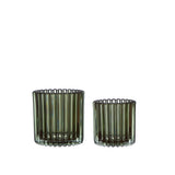 green ribbed candle holders with a clear ribbed design allowing light to pass through