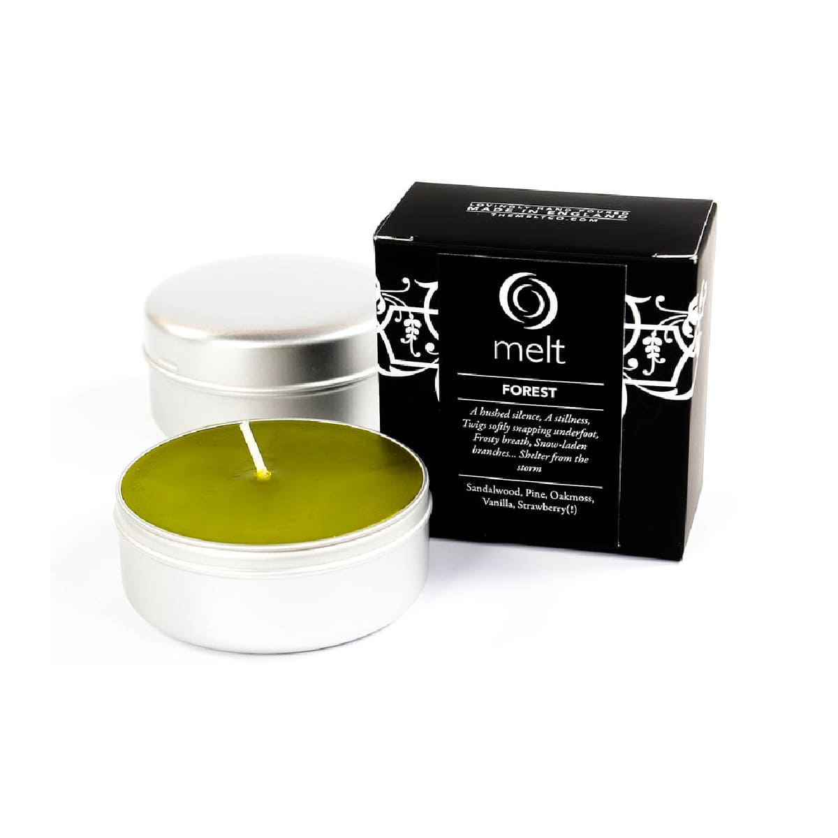 Melt Forest luxury travel tin candle with pine, sandalwood and oakmoss fragrance notes, styled as a compact woodland scented candle for cosy interiors.