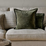 Nkuku green velvet and linen cushions