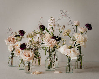 Ribbed Glass Bottles filled with Flowers
