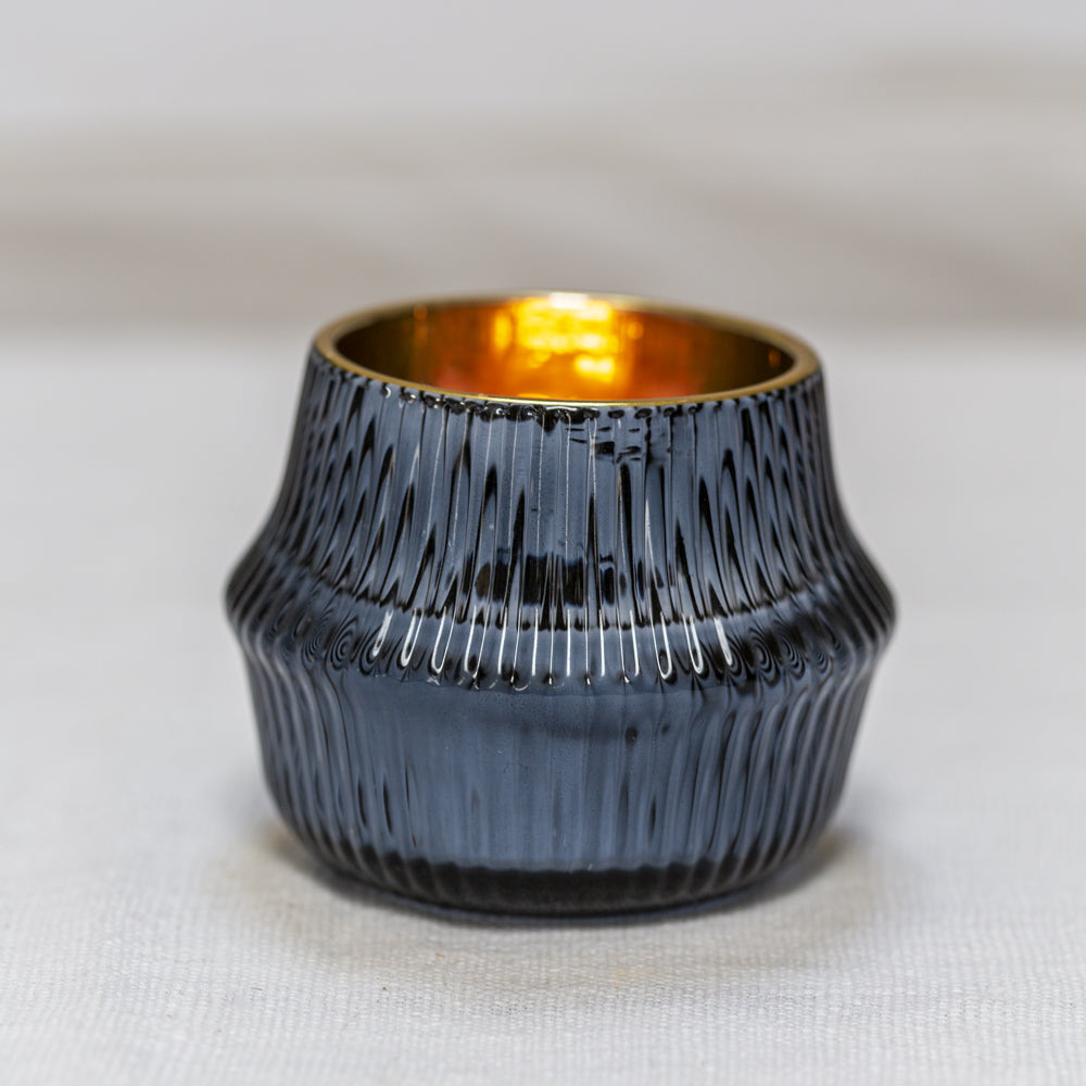 Prussian Blue glass votive, with golden lining, throws the most gorgeous warm glow 