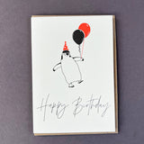 Penguin Ink Happy Birthday Penguin letterpress card featuring a chinstrap penguin wearing a neon spotty party hat and holding balloons, printed on 100% recycled board with an embossed finish.