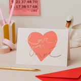 “Love You More” Red Heart Rose Gold Foil Valentine’s Card