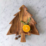 Acacia wood Christmas tree-shaped serving board for cheese, charcuterie and festive Christmas nibbles.