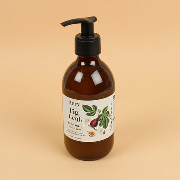 Luxury Aery Fig Leaf Hand Wash with black fig, vetiver and cedarwood. Naturally derived ingredients in a refillable 300ml bottle for everyday wellbeing.