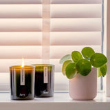 Fresh cypress and zesty orange with hints of sandalwood — Aery’s Green Bamboo candle is bright, green and energising, designed to lift your spirits.
