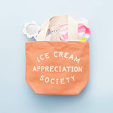 Alphabet Ice Cream Appreciation Society Little Canvas Bag in peach, a UK-made children's cotton tote bag for snacks, toys, holidays, beach days and everyday adventures.