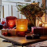 Amber Ribbed Glass Hurricane Vase and decorative candle holder.