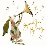 Anna Wright It's a Beautiful Baby greeting card featuring an illustrated trumpeting hare with gold foil embossed lettering on premium FSC-certified card.