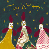 Anna Wright Three Wise Hen Christmas card featuring three illustrated hens with gold foil detailing and handwritten festive text.