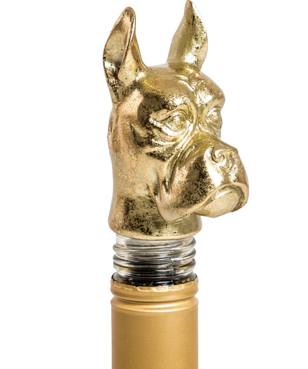 Antique gold dog head bottle stopper for wine and spirit bottles, designed as a decorative home bar accessory.