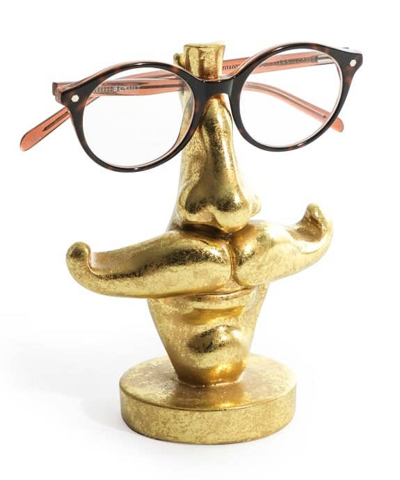 Quirky antique gold moustache glasses holder. A decorative and practical stand for spectacles or sunglasses. Perfect for desks or bedside tables.