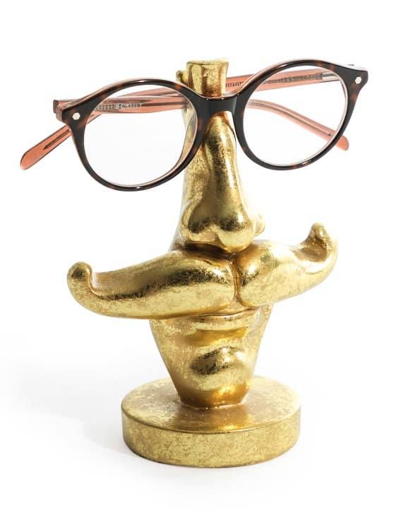 Quirky antique gold moustache glasses holder. A decorative and practical stand for spectacles or sunglasses. Perfect for desks or bedside tables.