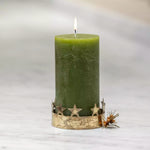 Antique gold pillar candle holder with decorative star cut-out crown detail