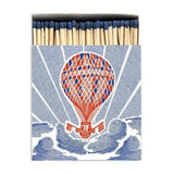 Archivist Balloon luxury matchbox featuring an illustrated hot air balloon with 125 extra-long matches for lighting candles and fireplaces.