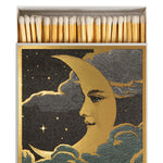 Luxury Moon matchbox by Chase & Wonder featuring a gold foil moon set against a dark night sky and containing 125 matches.