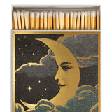 Luxury Moon matchbox by Chase & Wonder featuring a gold foil moon set against a dark night sky and containing 125 matches.