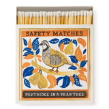 Archivist Partridge in a Pear Tree luxury matchbox with gold foil detailing and 125 extra-long safety matches for festive candles and fireplaces.