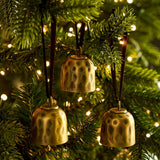 Shop the Ardington Set of 3 Hanging Christmas Bells, crafted from hand-hammered steel with an antique brass finish and natural jute rope for festive styling.