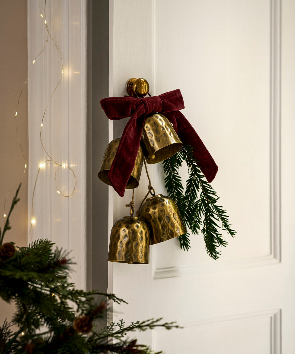 Ardington Set of 4 Antique Brass Hanging Christmas Bells on natural jute rope.