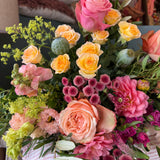 Luxury August Bouquet of the Month featuring seasonal dahlias, Bandolero tea roses, Peach Shimmer roses, apricot lisianthus, snapdragons and olive foliage in buttery yellow, apricot and dusky pink tones.