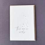 Penguin Ink There Are No Words letterpress sympathy card featuring metallic silver hearts and modern calligraphy, printed on 100% recycled board with a tactile embossed finish.