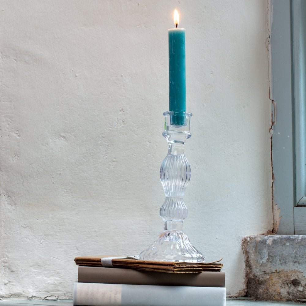 Bella clear glass candlestick holder styled with a coloured dinner candle