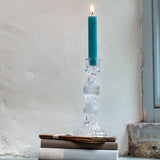 Bella clear glass candlestick holder styled with a coloured dinner candle